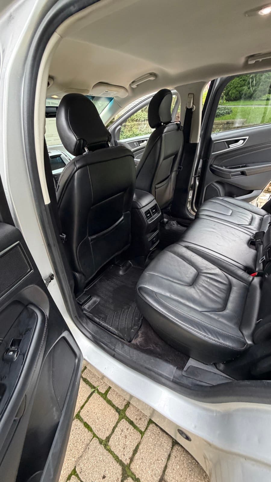 Ford Edge black leather back seats cleaned by Neat Touch Auto Spa